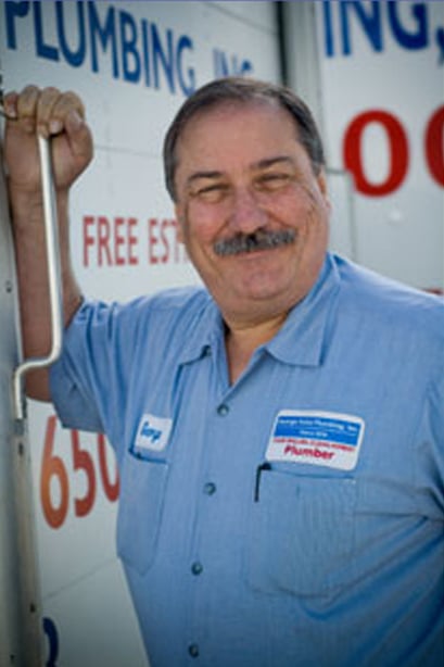 George Salet holding a sign