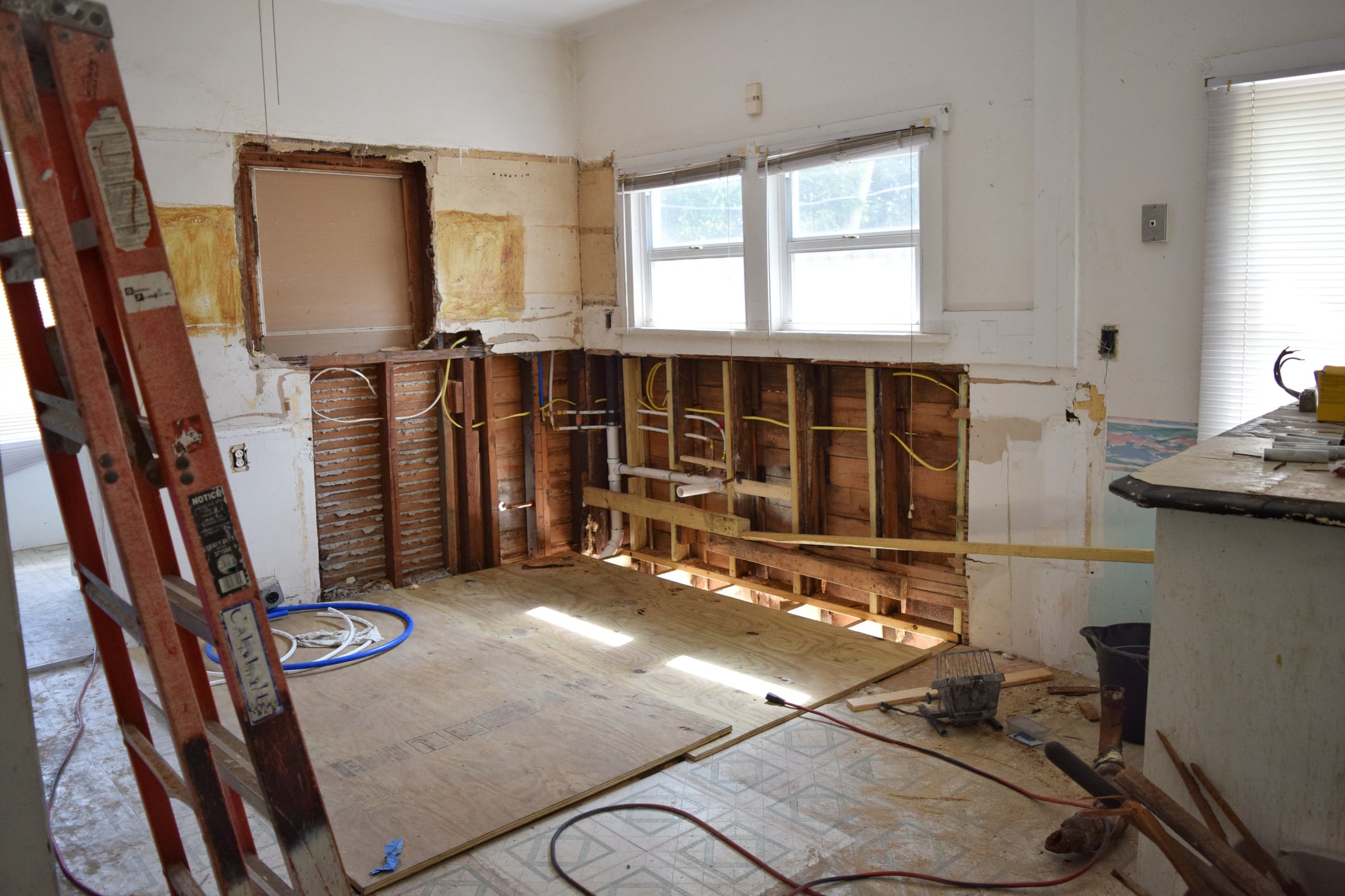 a kitchen with a sink and a window